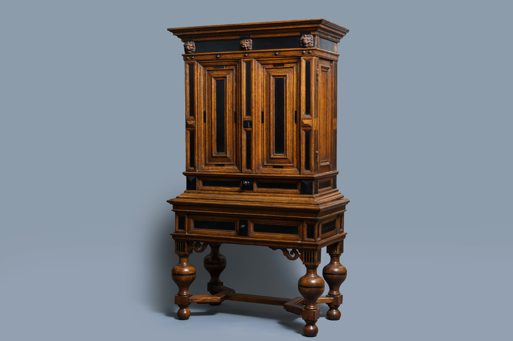 An oak and ebony two-door cabinet, The Low Countries, 17th C.