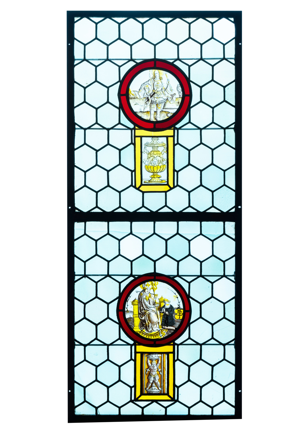 A composite stained and painted glass window mounted in lead alloy, France, 16th C.