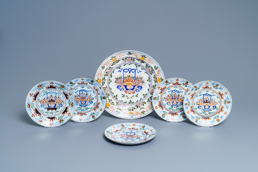 Five polychrome Dutch Delft plates and a dish with flower baskets, 18th C.