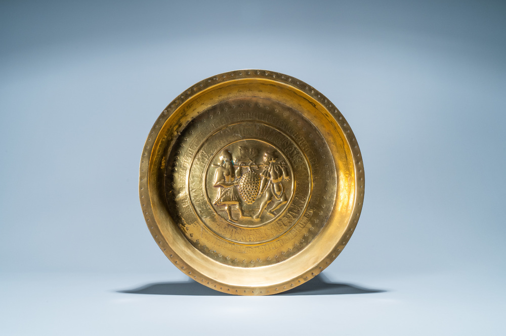 A brass alms basin depicting 'The Spies of Canaan', Nuremberg, Germany, 16th C.