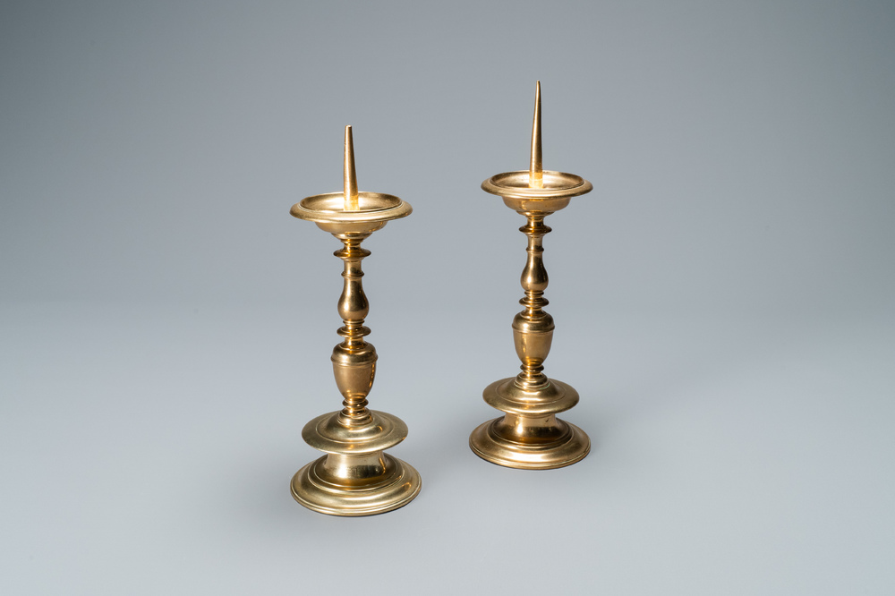 A pair of brass alloy candlesticks, Italy, 17th C.