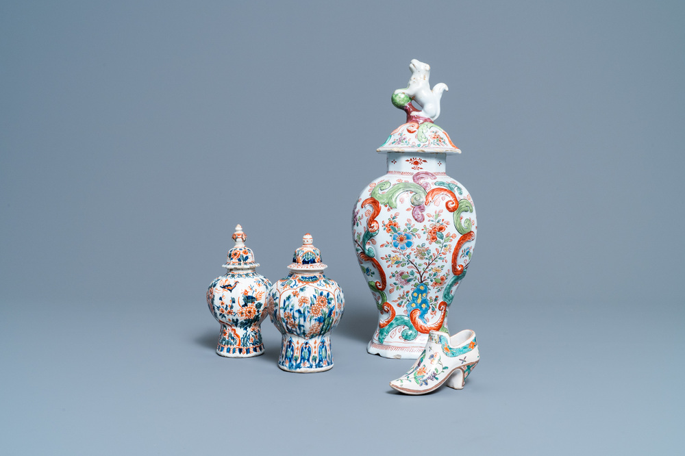 A polychrome petit feu and gilded Dutch Delft covered vase, a shoe and a pair of cashmere palette covered vases, 18/19th C.