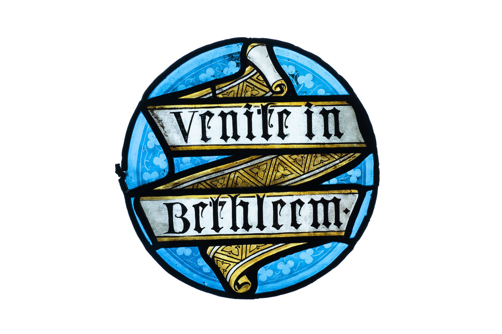 A stained glass roundel inscribed 'Venite in Bethleem', 17th C.