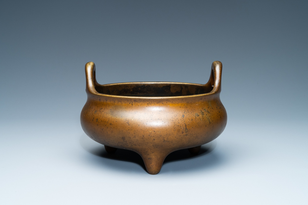 A Chinese bronze tripod censer, Xuande mark, 18th C.