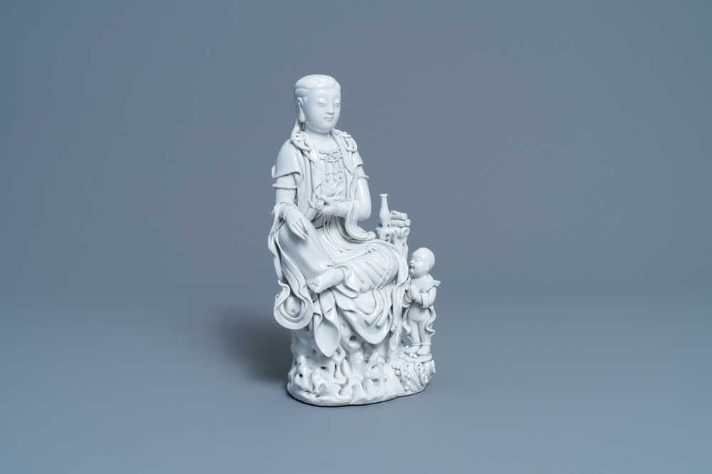 A Chinese Dehua blanc de Chine figure of Guanyin, He Chaozong mark, 20th C.