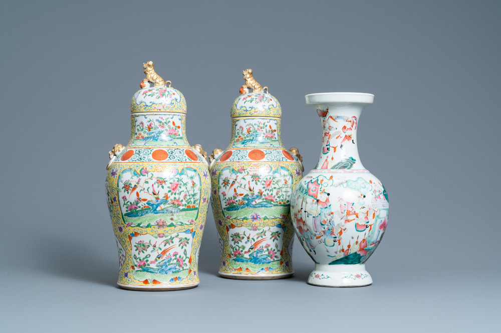 A pair of Chinese Canton famille rose yellow-ground vases and a 'warrior' vase, Qianlong mark, 19th C.