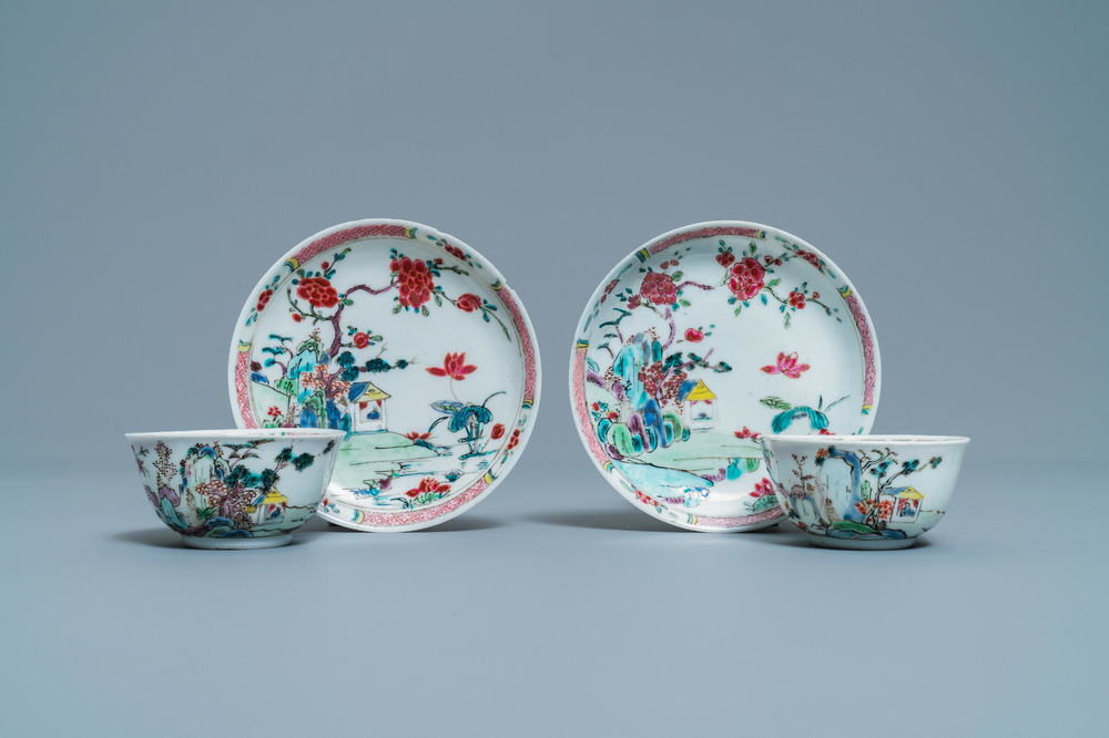 A pair of Chinese famille rose cups and saucers with landscape design, Yongzheng