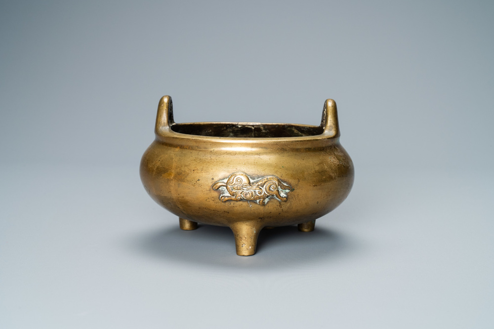 A Chinese bronze tripod 'elephants' censer, Qing