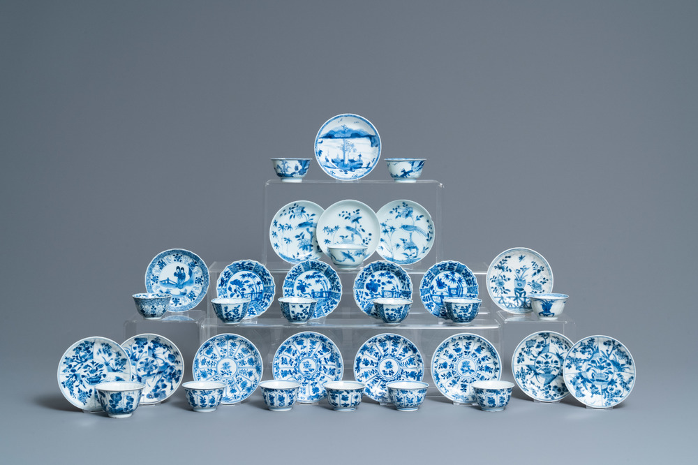 Fifteen Chinese blue and white cups and eighteen saucers, Kangxi