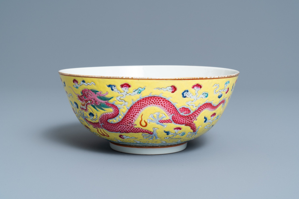 A Chinese yellow-ground famille rose 'dragon and phoenix' bowl, Xuantong mark and of the period