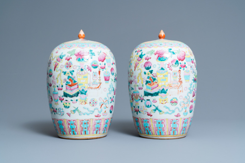 A pair of Chinese famille rose 'antiquities' jars and covers, 19th C.