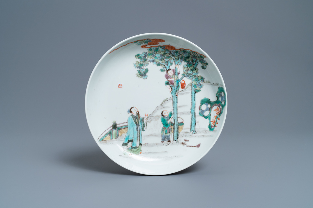 A Chinese famille verte dish with a boy in a tree, Yongzheng