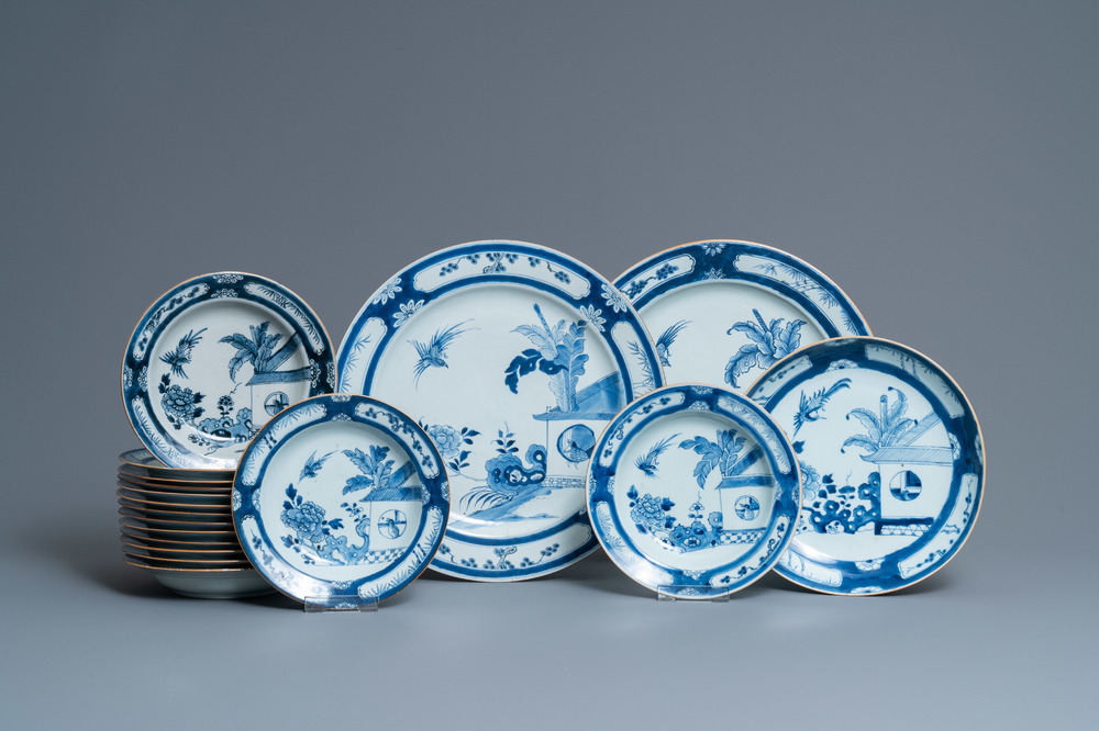 Fifteen Chinese blue and white plates and three dishes with 'cuckoo in the house' design, Qianlong