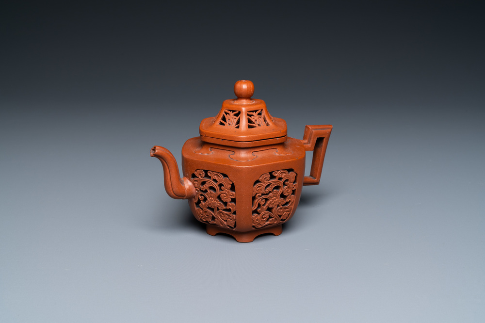 A Chinese reticulated double-walled Yixing stoneware teapot and cover, Kangxi