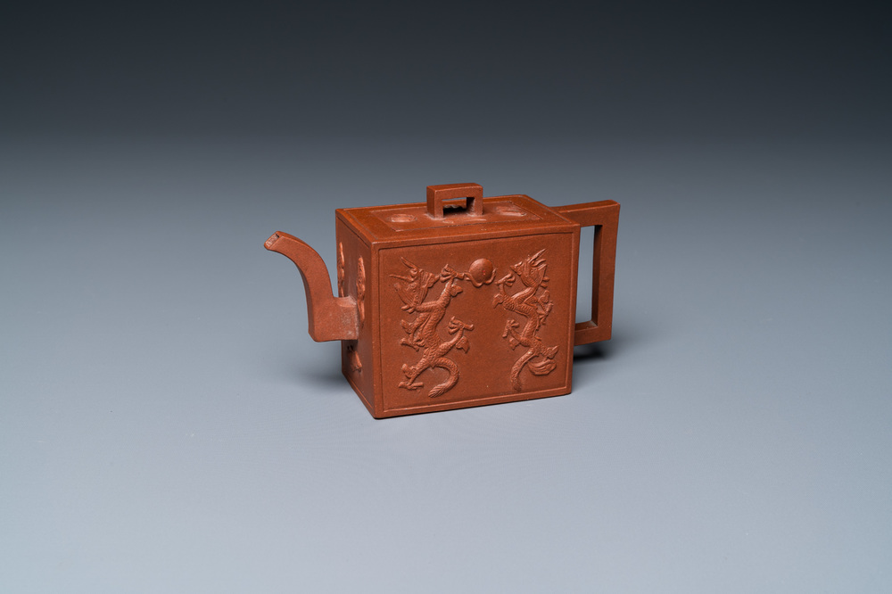 A Chinese rectangular Yixing stoneware 'dragon' teapot, seal mark, Kangxi