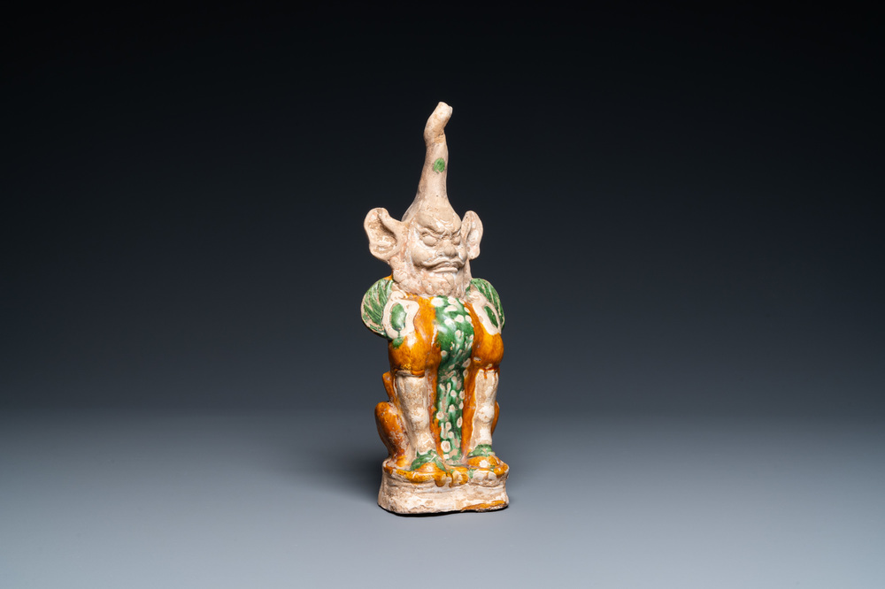 A Chinese sancai-glazed pottery 'earth spirit' figure, Tang