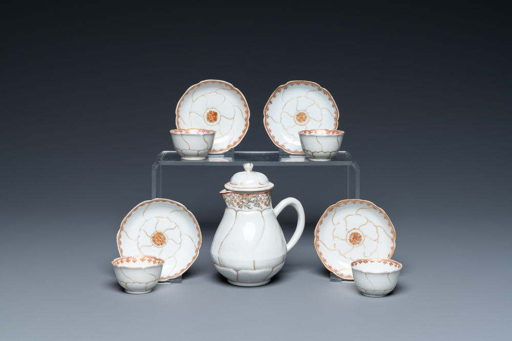 Four Chinese iron-red and gilt cups and saucers and a covered jug, Yongzheng/Qianlong