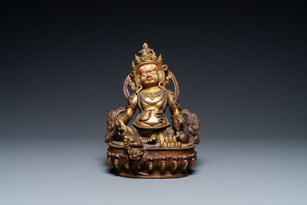 Une figure de Jambhala en bronze partiellement dor&eacute; au dos inscrit, Sino-Tibet, 19&egrave;me