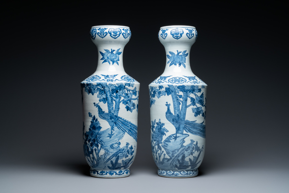 A pair of Chinese blue and white 'peacock' vases, Qianlong mark, 20th C.