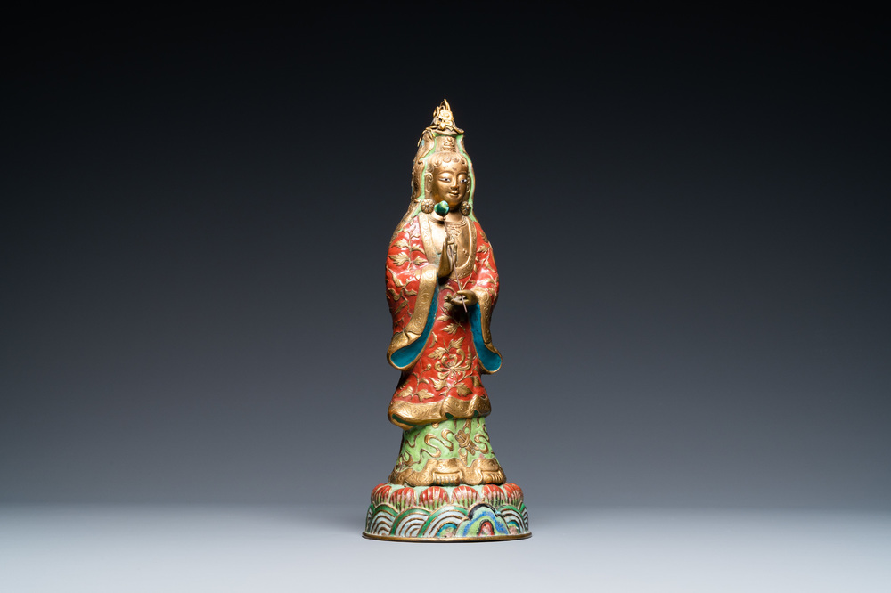 A Chinese champlev&eacute; enamel and gilt copper figure of Guanyin, Qing
