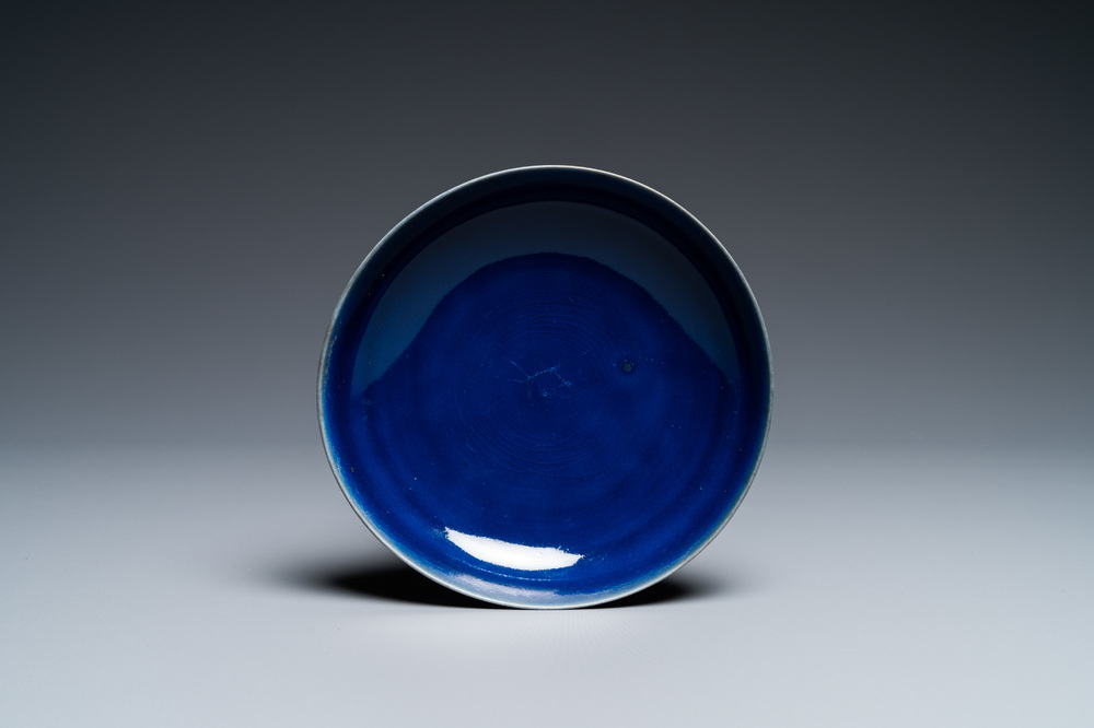 A Chinese monochrome blue dish, Qianlong mark and of the period