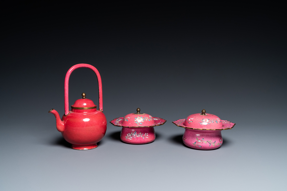 A Chinese ruby-ground Canton enamel teapot and a pair of covered bowls, Qianlong/Jiaqing