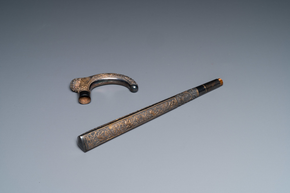 A Vietnamese gilt silver cane handle and a parasol handle, marked 'VINH SADEC', 19th C.