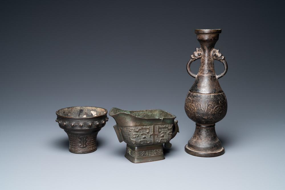 A Chinese bronze vase, a ewer and a censer, Ming/Qing