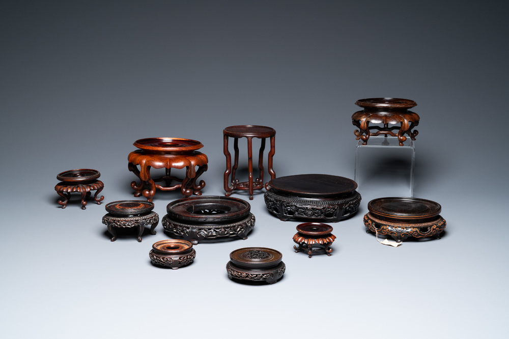 A varied collection of Chinese wooden stands, 18/20th C.