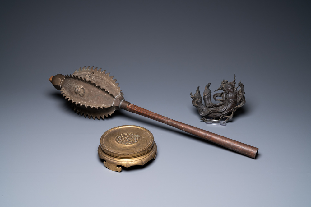 A bronze stand, a weapon and a figurative ornament, China and Vietnam, 19/20th C.