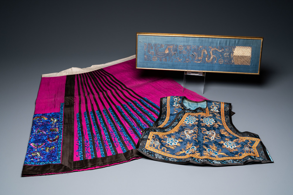 A Chinese embroidered silk jacket, a skirt and a sleeve fragment, Qing