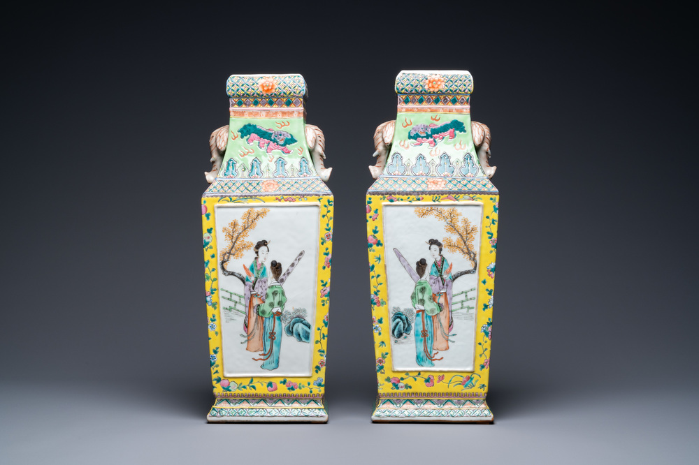 A pair of Chinese famille rose elephant head-handled vases, 19th C.
