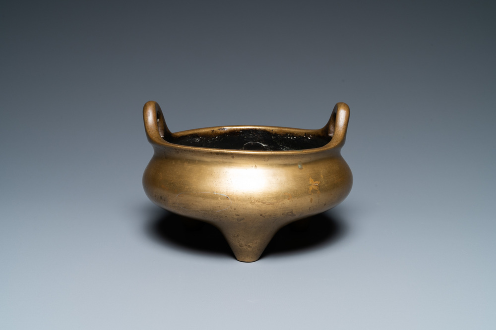 A Chinese bronze tripod censer, Xuande mark, 19th C.