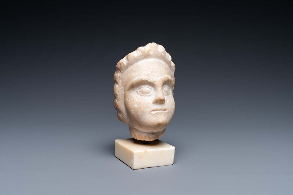 A Roman provicincial marble head of a boy, 2nd/3rd C.