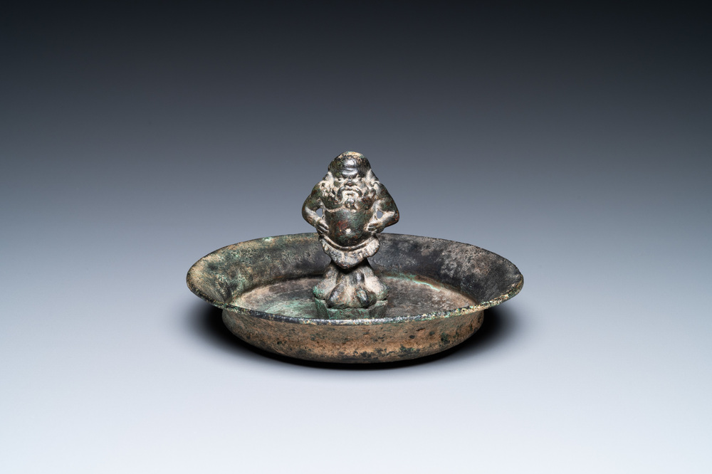 A Roman bronze 'satyr' bowl, probably 3rd/6th C.