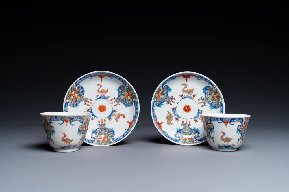 A pair of Chinese famille rose cups and saucers with aquatic birds, Qianlong