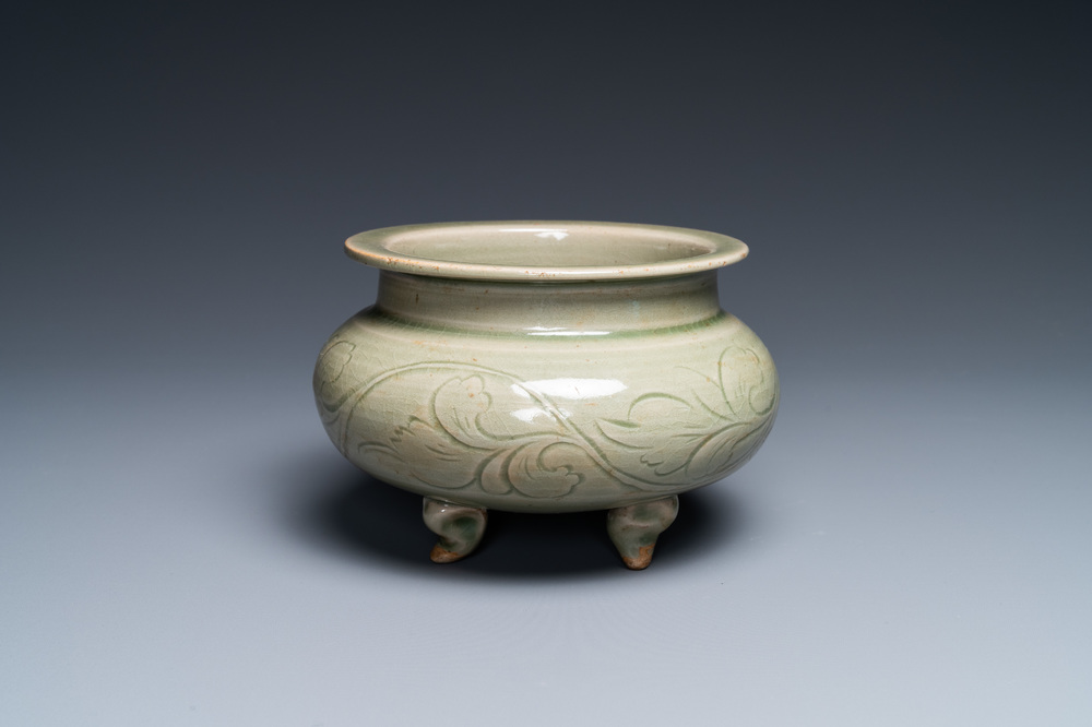 A Chinese Yaozhou celadon tripod censer, Song or later