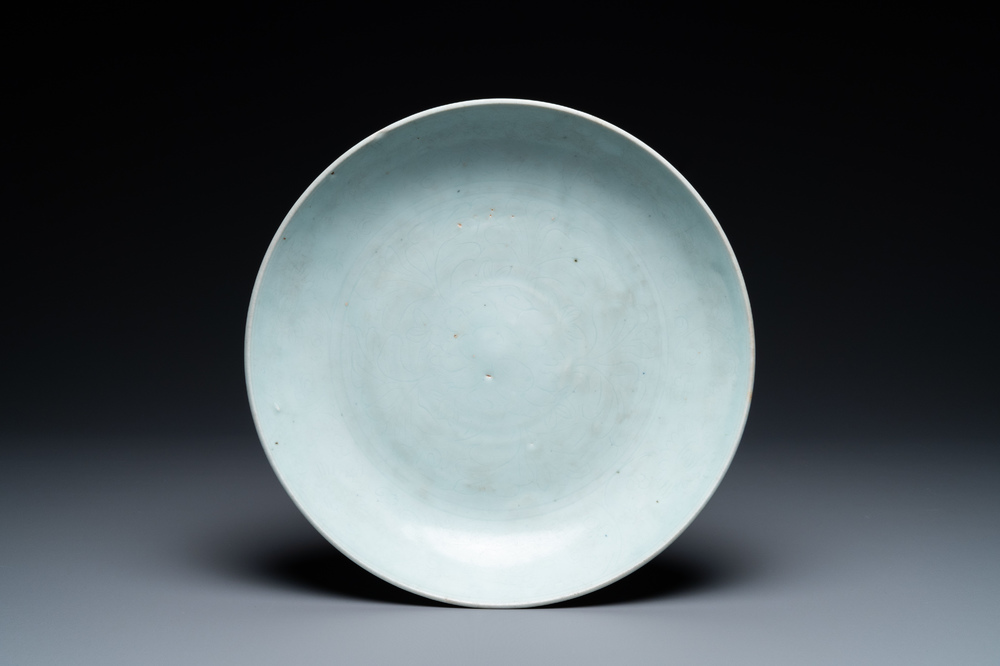 A Chinese qingbai dish with incised floral design, Ming