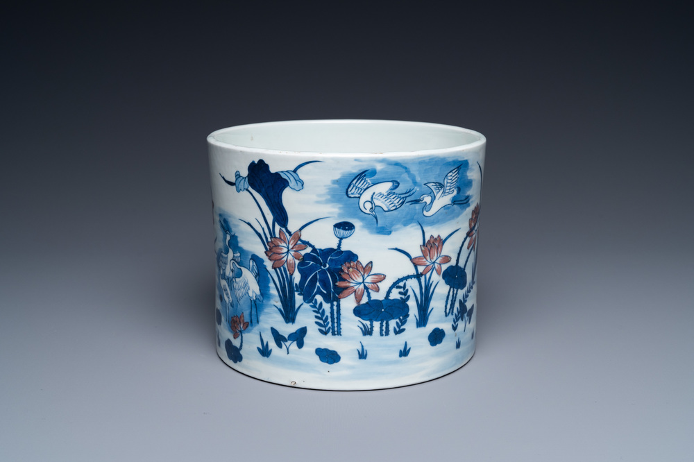 A large Chinese blue, white and copper-red brush pot, 19th C.