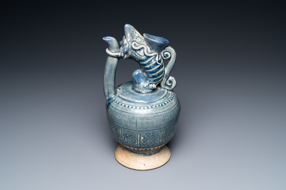 A very rare Vietnamese or Annamese blue-glazed 'shrimp' ewer, 15/16th C.