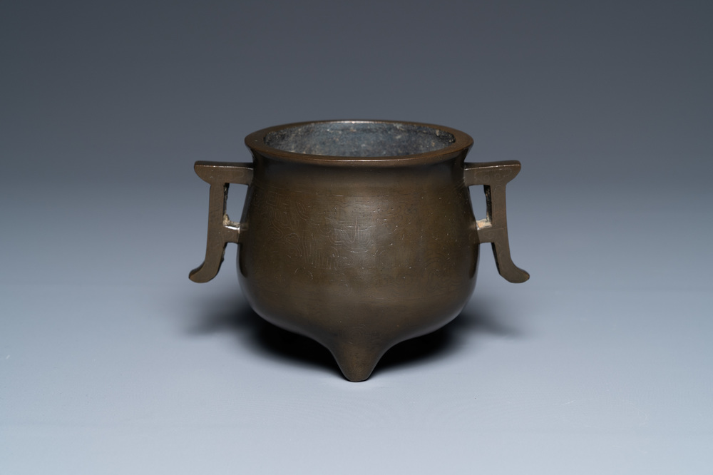 A Chinese silver-inlaid bronze censer, Xuande mark, Qianlong