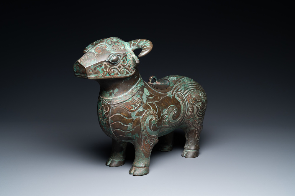 A Chinese ram-shaped silver-inlaid bronze 'xizun' vessel, Ming