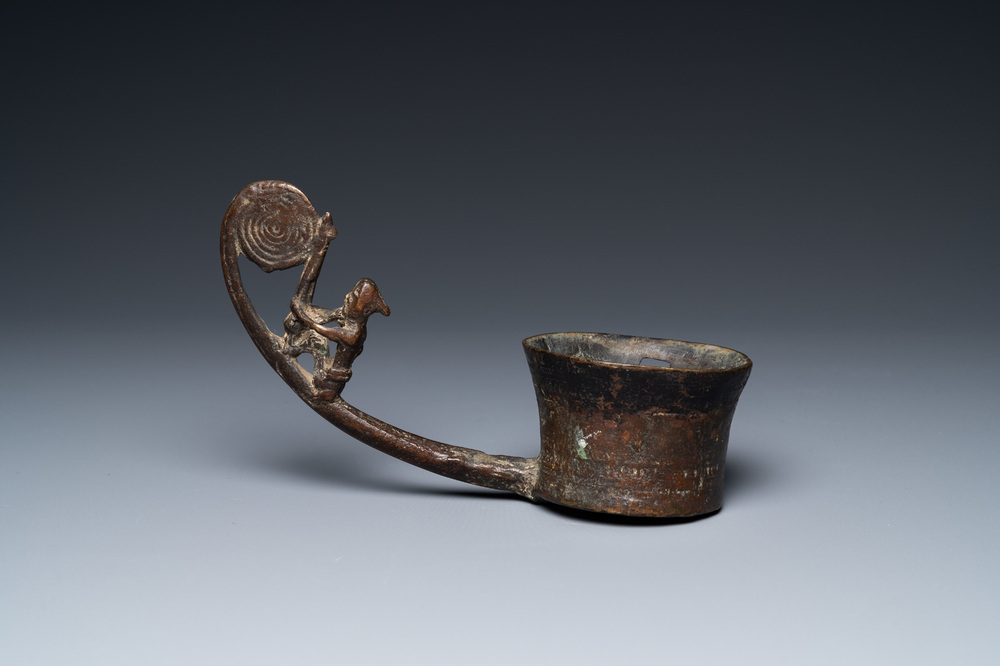 A Vietnamese bronze ladle depicting a musician, Dong Son, ca. 5th/2nd C. BC