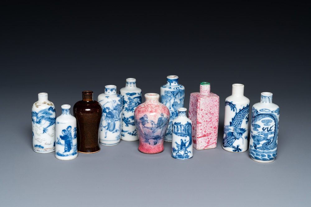 Eleven Chinese mostly blue and white snuff bottles, 19/20th C.