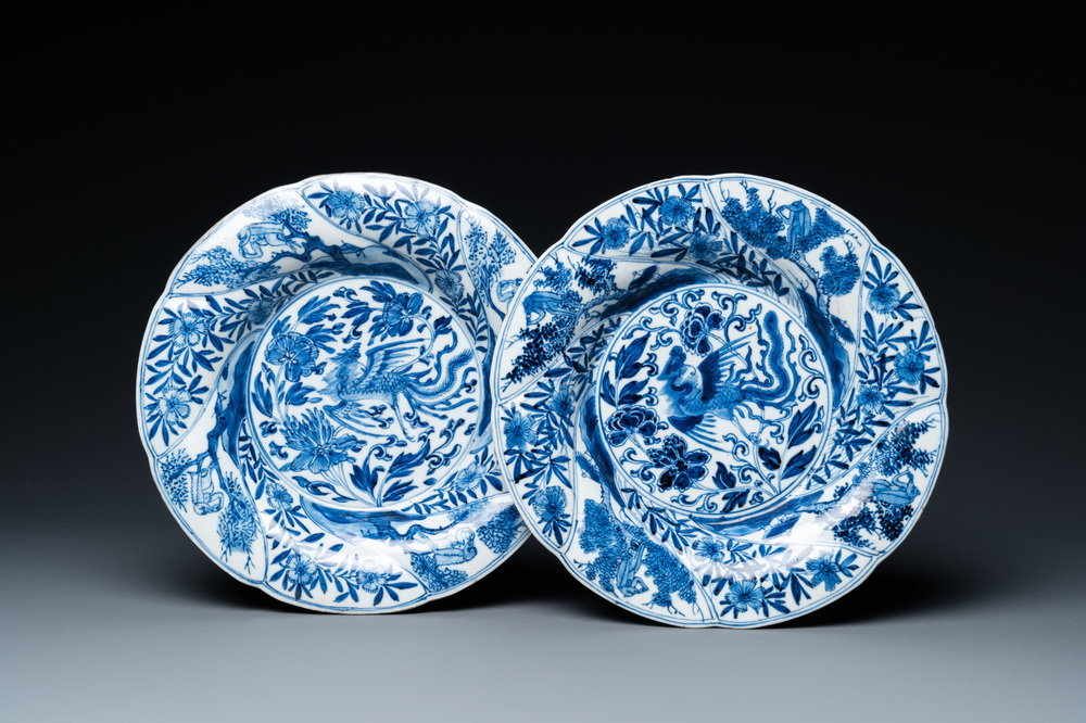 A pair of Chinese blue and white lobed 'phoenix and monkey' plates, Kangxi