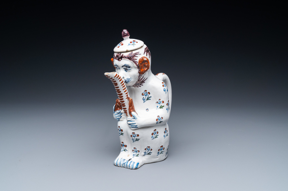 A rare Brussels faience monkey-shaped ewer and cover, 18th C.