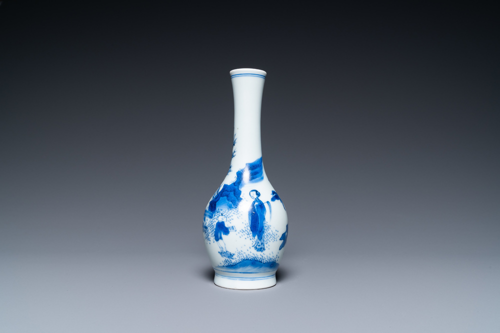 A Chinese blue and white bottle vase with a lady and her servant in a landscape, Transitional period