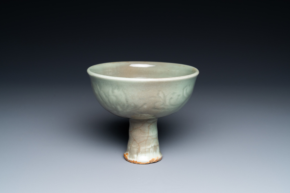A Chinese Longquan celadon stem cup with underglaze design, Ming