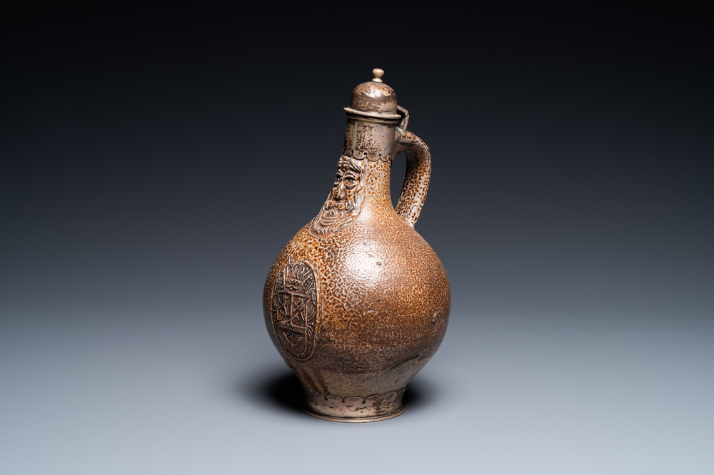 An English silver-mounted stoneware bellarmine jug, Frechen, 17th C.