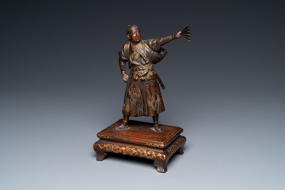 A Japanese patinated and gilded bronze figure of a warrior, signed Miyao, Meiji, 19th C.